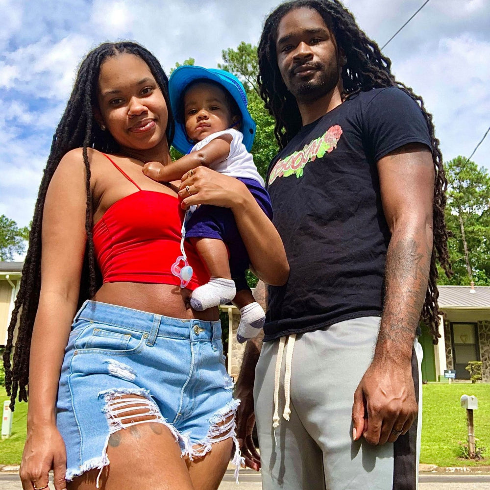 Black Married couple with long dreadlocks