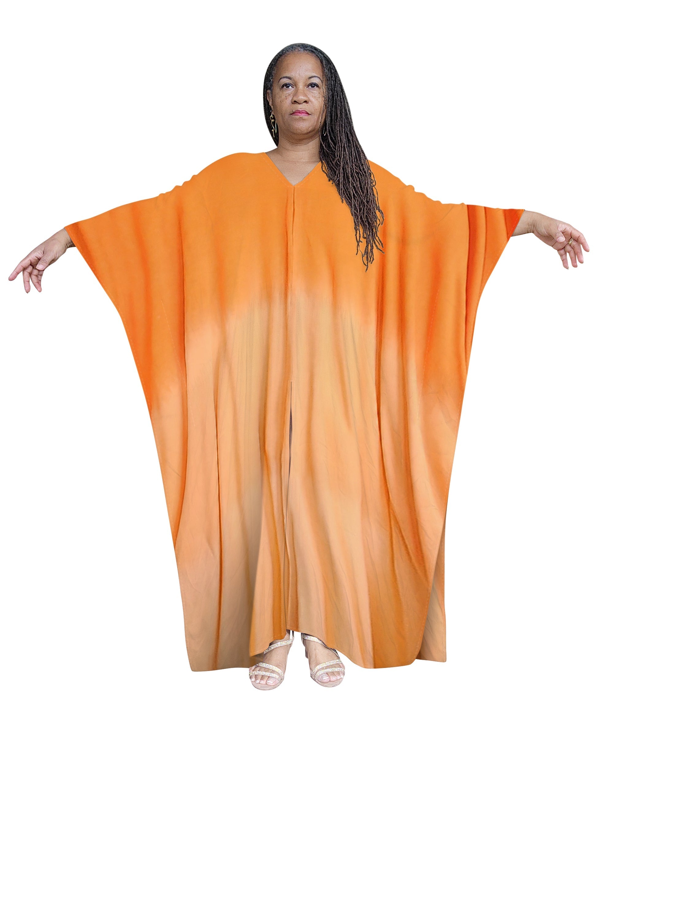 Soft orange hand-dyed kaftan maxi dress with a gradient effect. A stylish and comfortable outfit for casual and festive occasions.