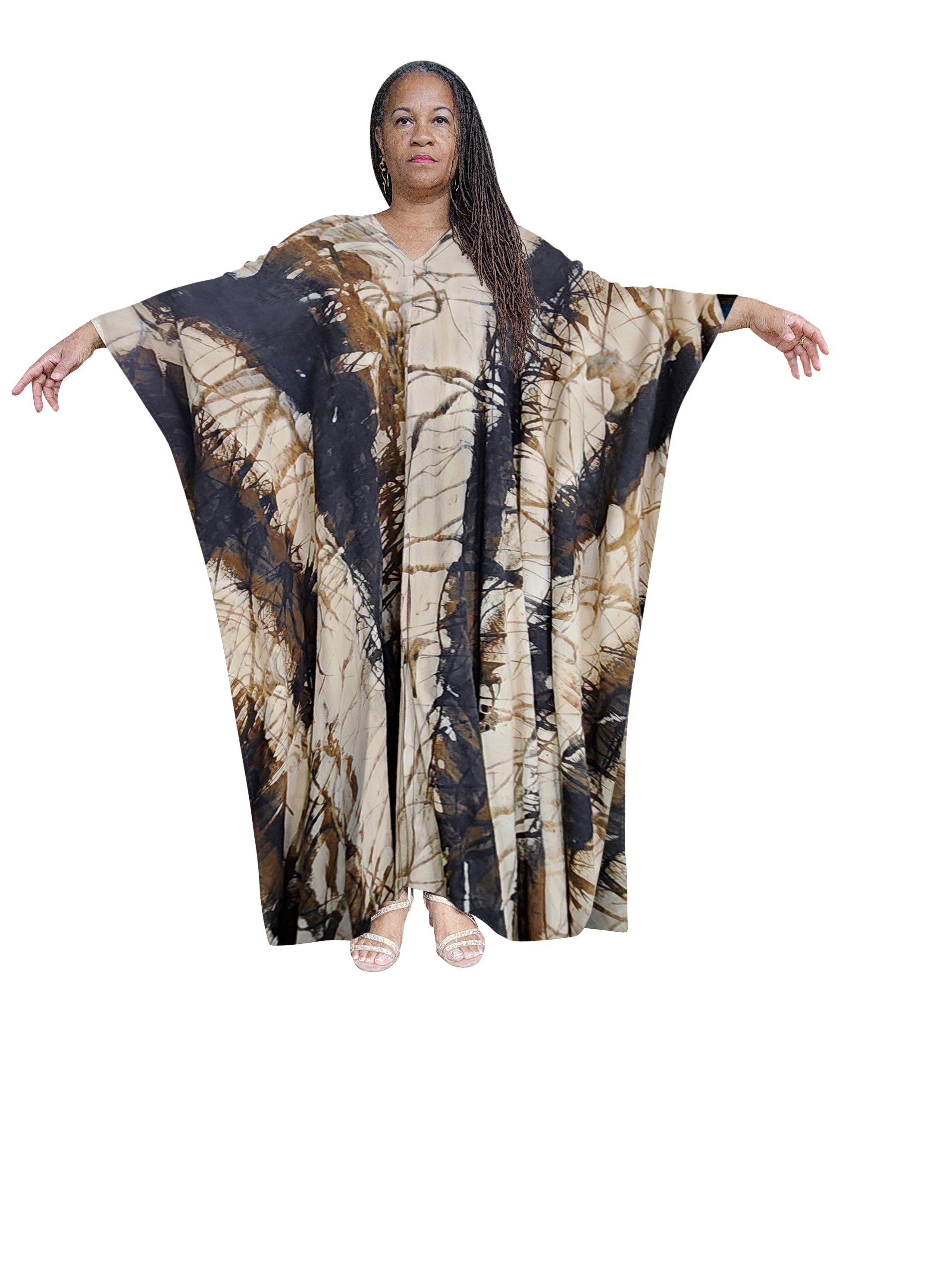 Neutral-toned hand-dyed kaftan maxi dress in beige and black with an abstract tie-dye pattern. A stylish and versatile outfit for any occasion.