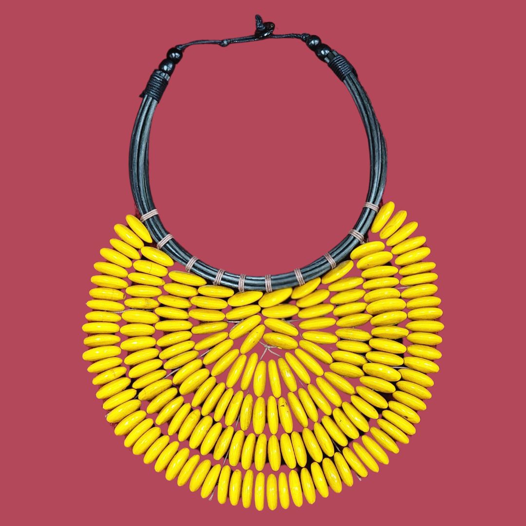 Handmade Citrine Cascade Collar with vibrant yellow wooden beads and black cord. A striking handcrafted necklace for bold and elegant looks.