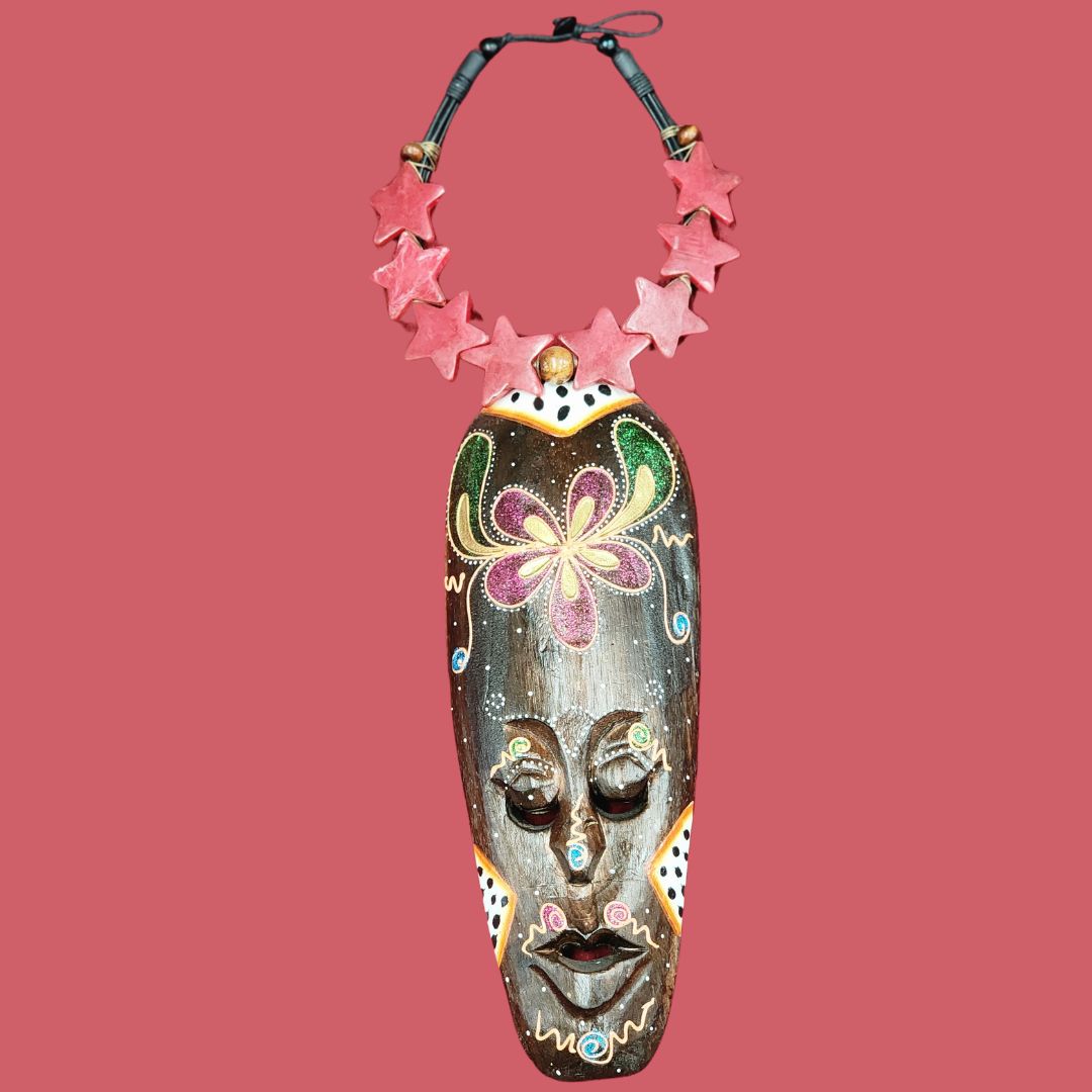 Coral Starlight Necklace featuring handcrafted wooden beads and star-shaped coral accents. Unique African-inspired jewelry piece for bold fashion statements.