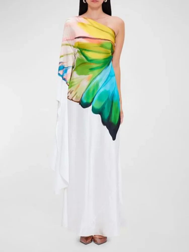 Chic floral print one-shoulder maxi dress featuring a colorful wing-inspired design. A sophisticated choice for evening wear and vacations.