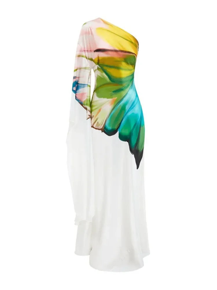 Side view of a one-shoulder maxi dress with a bold, colorful wing print. A stylish and unique choice for formal and casual events.