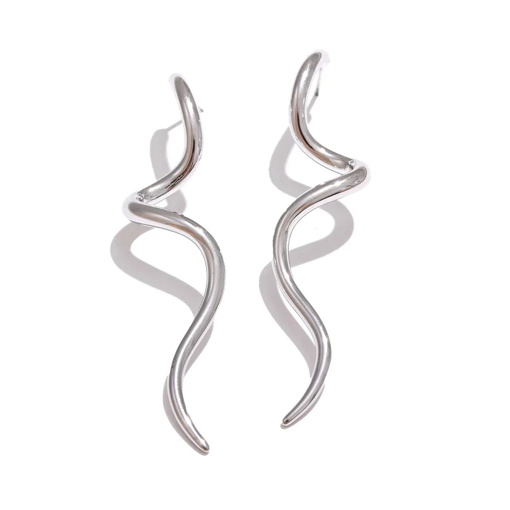 Silver flowing metal geometric long stud earrings with a wavy design, offering a modern and sophisticated jewelry choice.