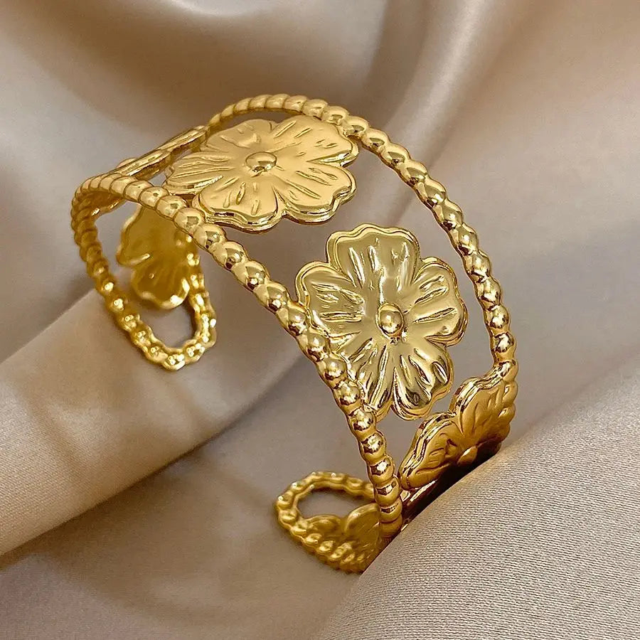 Gold Hollow Flower Hair Cuff with vintage floral design and beaded edge.