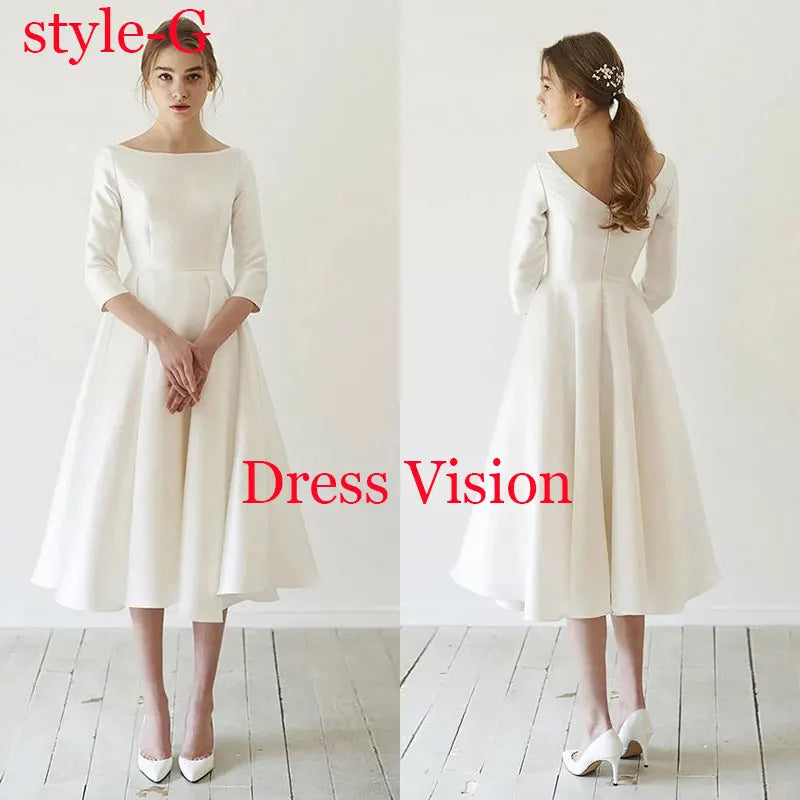 Minimalist white midi dress with three-quarter sleeves and a boat neckline. A timeless and elegant wedding dress choice.