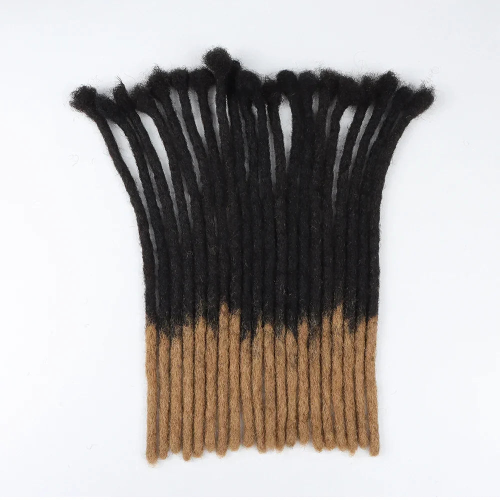 Black to brown ombre human hair loc extensions. 0.8 cm dreadlock extensions for a natural and stylish look.