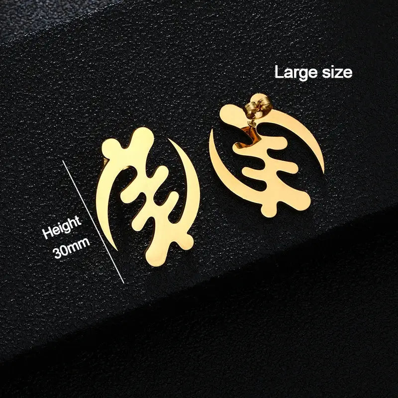Large gold Adinkra symbol stud earrings with a 30mm height. Bold African-inspired jewelry piece for statement fashion.