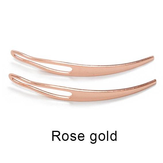 Pair of rose gold curved interlocking tools for Micro Locs, Sisterlocks, and Dreadlocks, designed for precise hair maintenance.