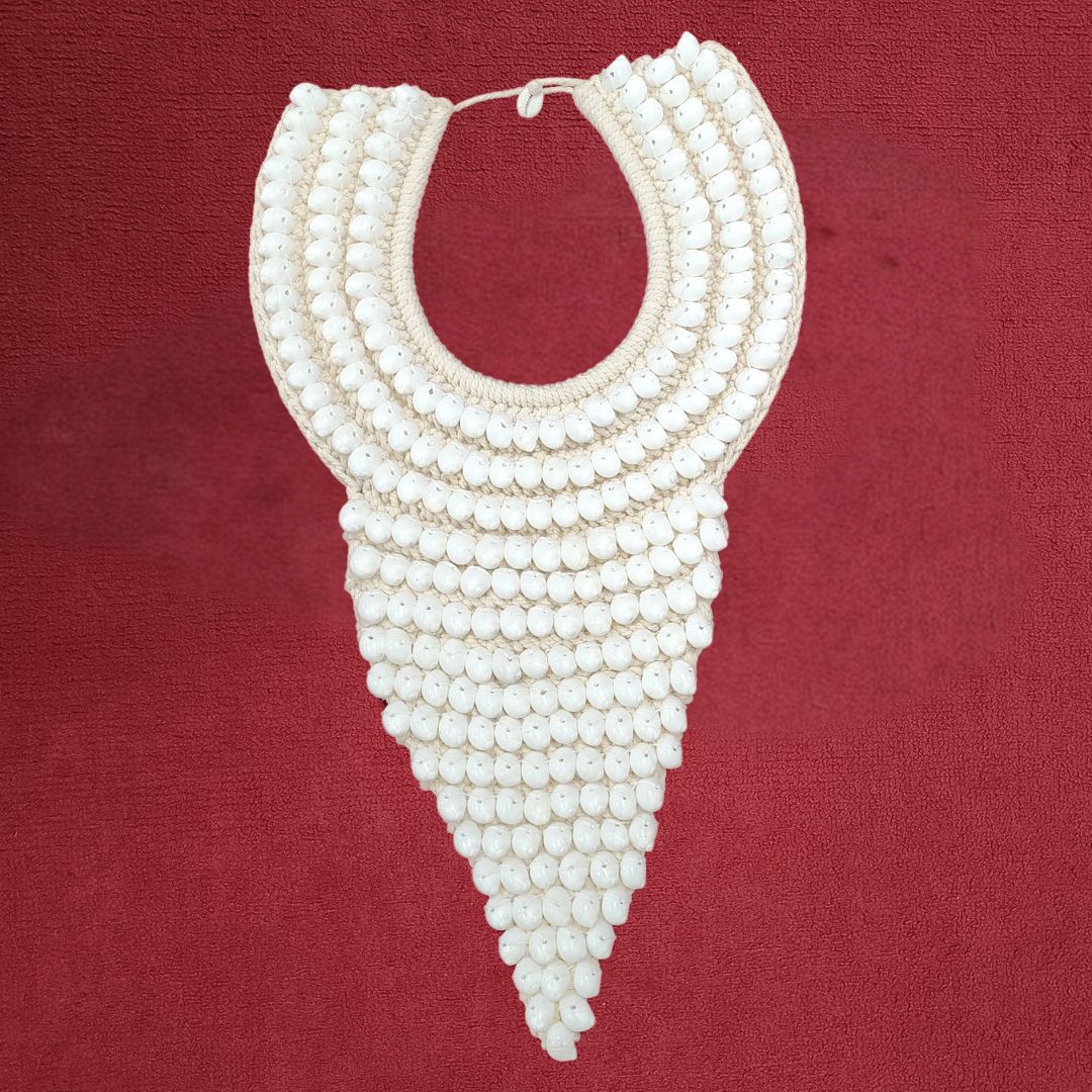 Ivory Elegance Bib Necklace featuring handcrafted wooden beads in a cascading design. Perfect statement jewelry for Memorial Day 2024.