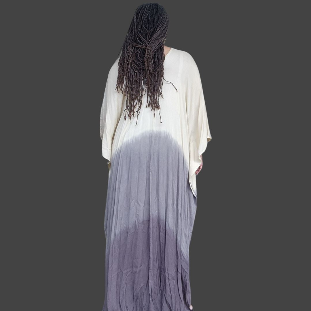 Back view of a hand-dyed kaftan maxi dress in beige and gray. A relaxed and stylish outfit for casual and festive occasions.