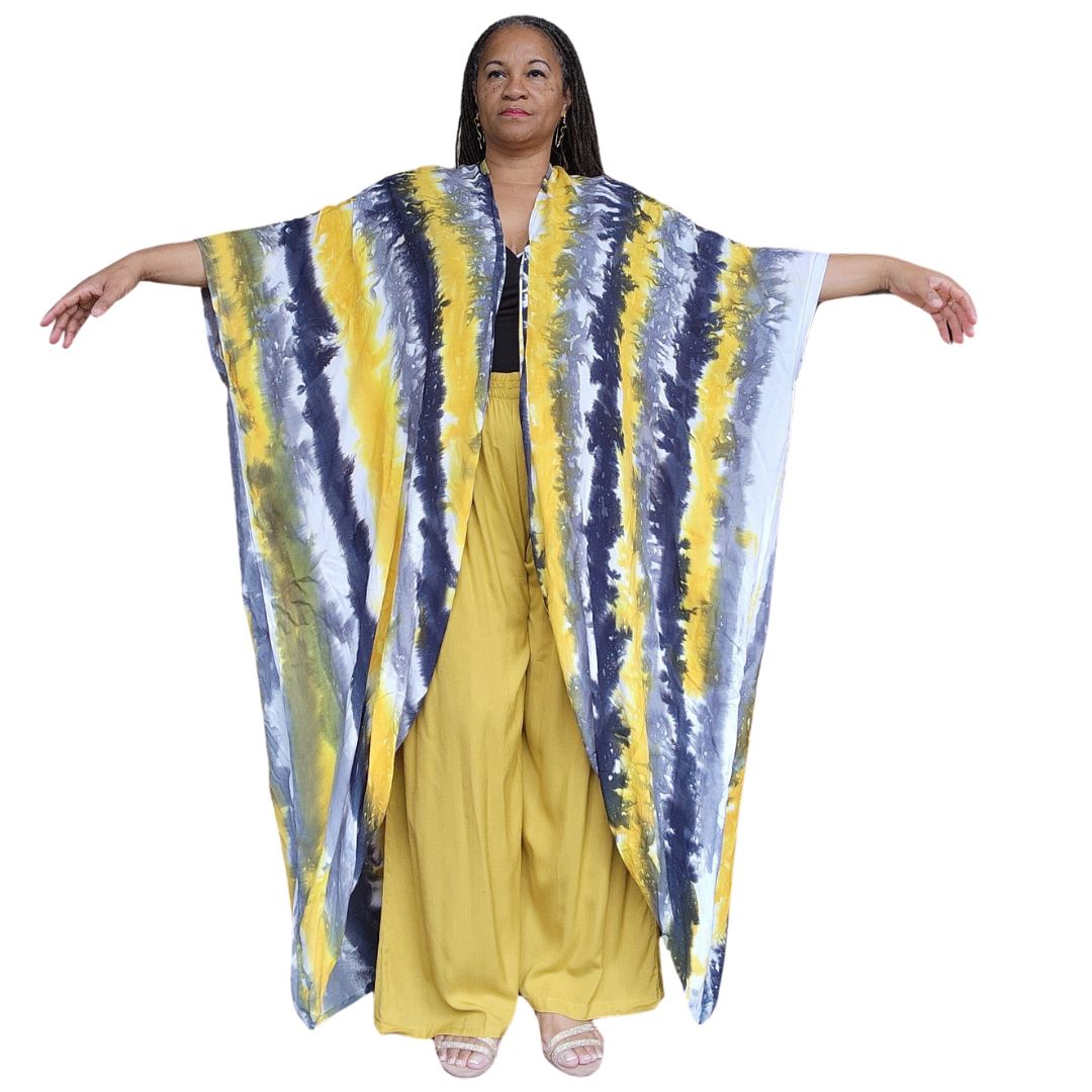 Elegant hand-dyed kimono with wide sleeves and pockets, featuring a striking yellow and black tie-dye pattern. Ideal for layering over dresses.