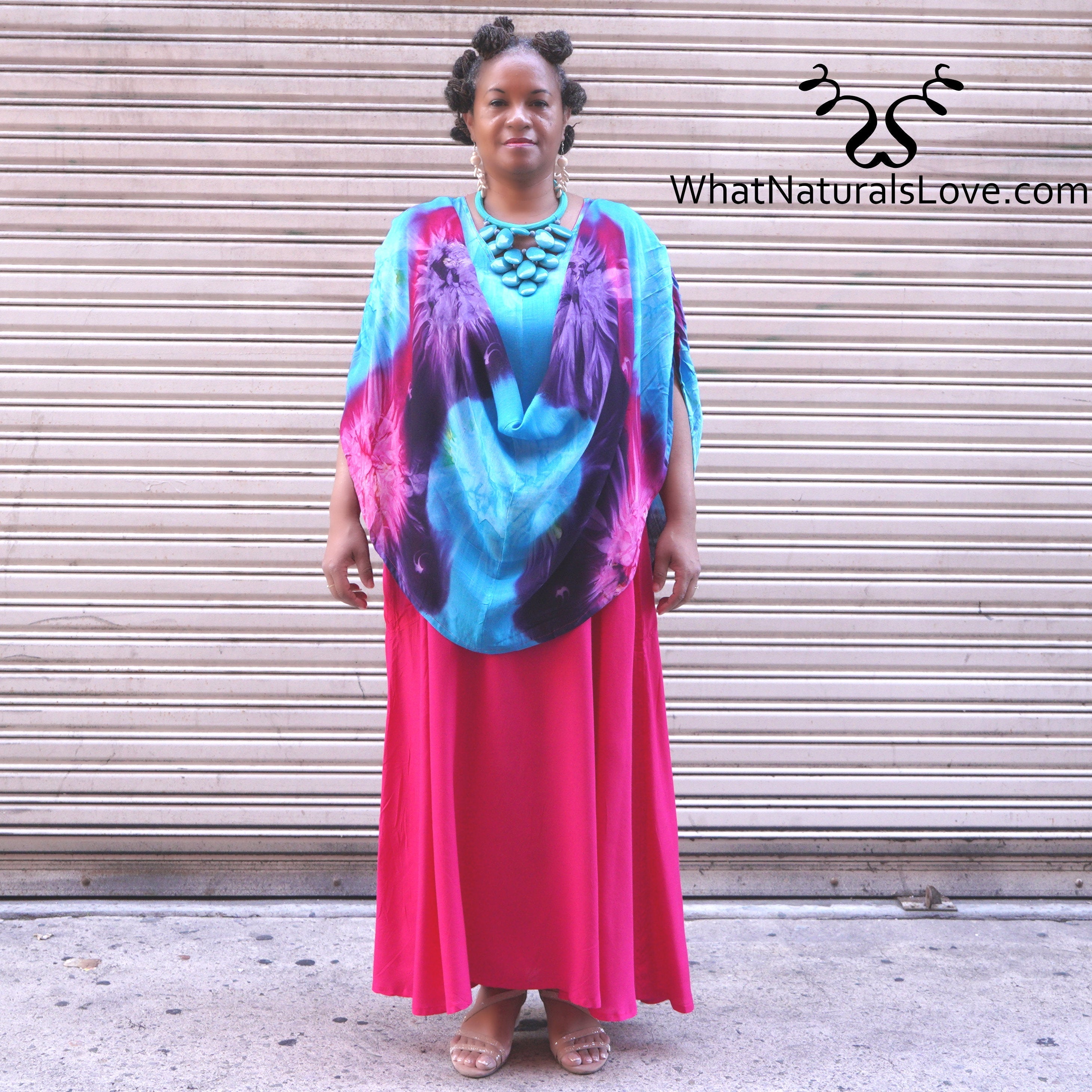 Moroccan Magic Dress Tye Dye worn as a draped poncho-style outfit, highlighting its multi-wear functionality. A comfortable and stylish long dress.