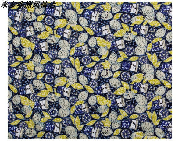 African fabric with blue and yellow intricate patterns, perfect for headwraps or clothing. A stylish and cultural textile option.