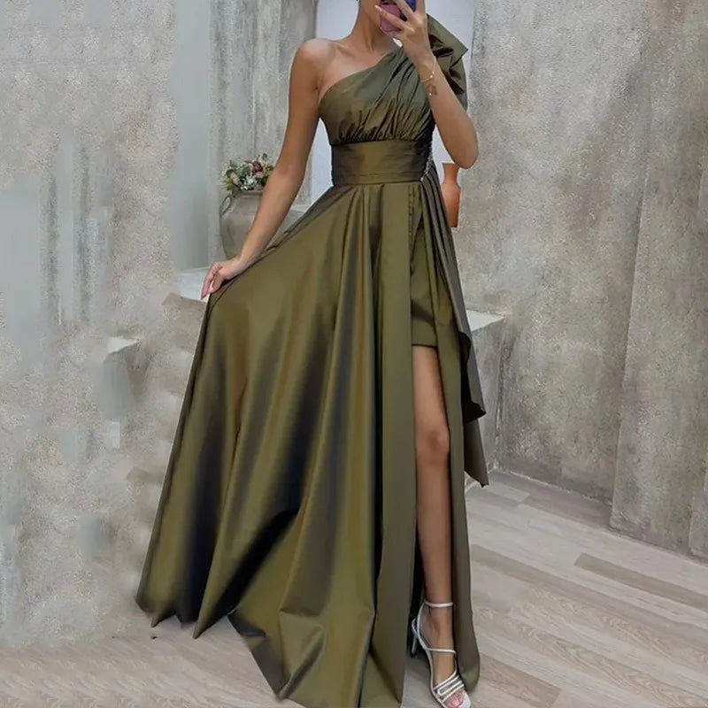 Full-length view of an olive green satin one-shoulder maxi dress with a flowing A-line design and high slit. Ideal for formal and party wear.