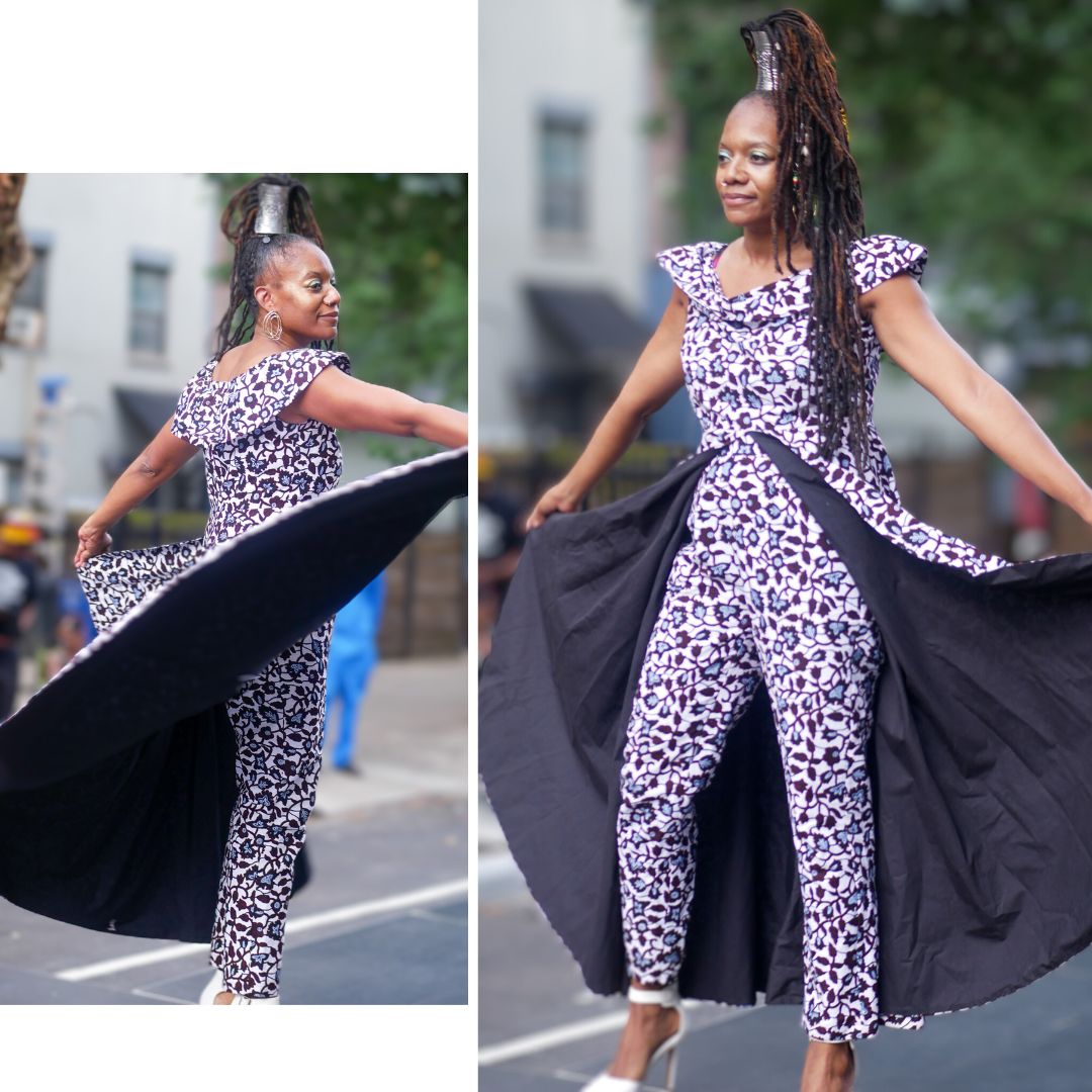 Stylish African pantsuit for women in black and white, designed with a dramatic flowing silhouette. Perfect for making a statement at any event.