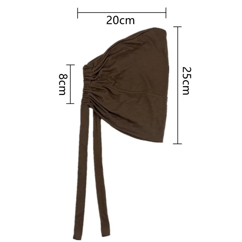 Brown adjustable headwrap with dimensions of 20cm width and 25cm length, featuring a tie-back for a customizable fit.