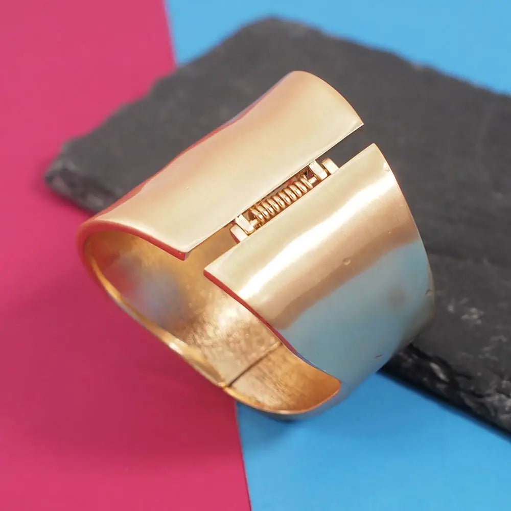 Back view of the Sunset Gleam Hair Cuff showing its adjustable spring hinge closure for a secure and comfortable fit.