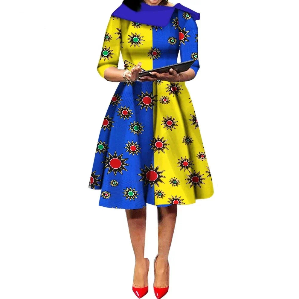 African Ankara Wax Print Midi Dress in blue and yellow with red starburst patterns, offering a vibrant and bold look.