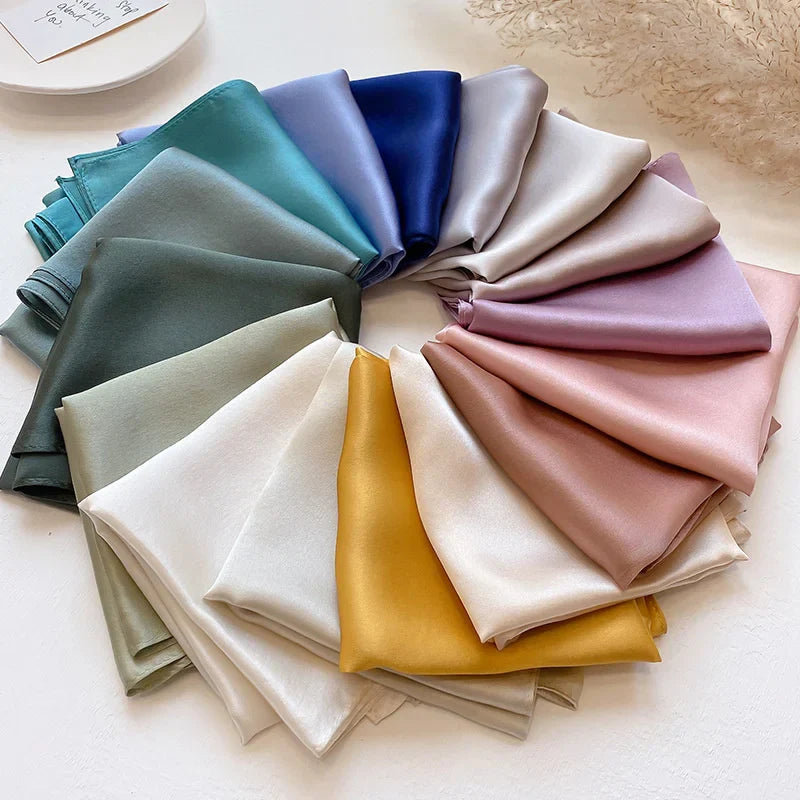 Silk Bandana Scarf - Ivory Elegant displayed in a circular arrangement with multiple color options, showcasing pure silk texture and timeless hue.
