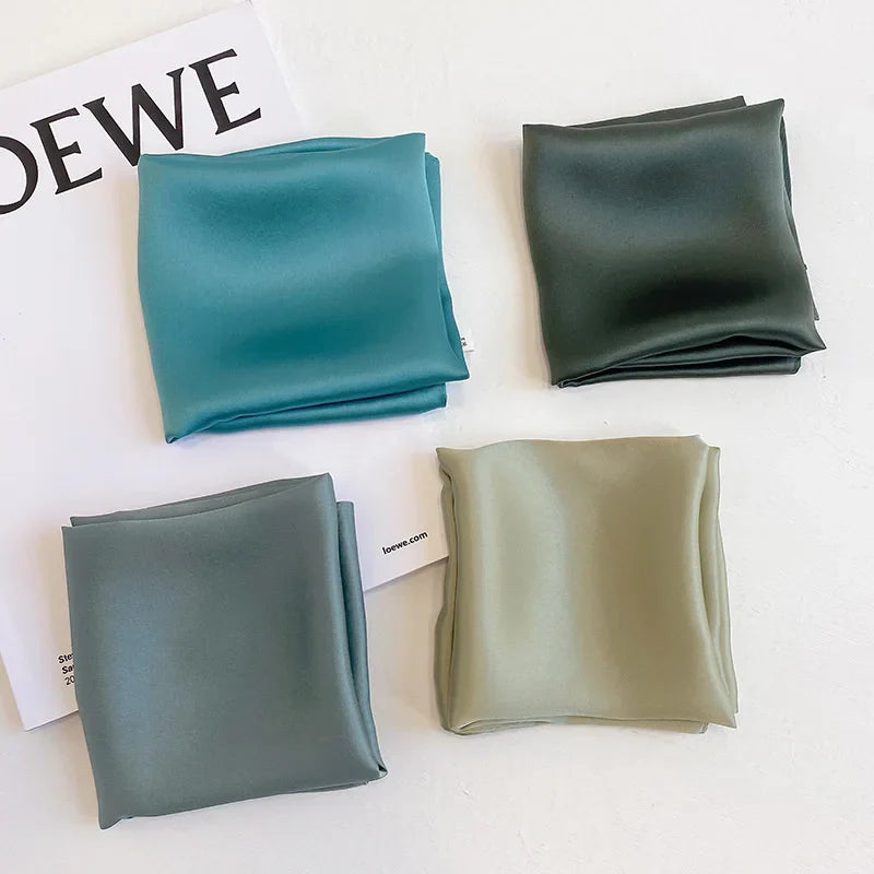 Silk Bandana Scarf - Ivory Elegant in four colors including teal, olive, sage, and ivory, made from 100% pure silk with a smooth finish.