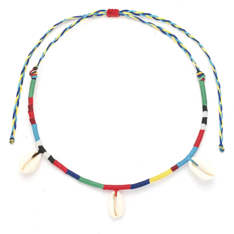 Colorful Handmade Cowrie Shell Necklace with braided cord, a vibrant accessory for casual and cultural events.
