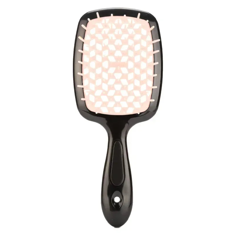 Clear detangling brush with a breathable design. Ideal for curly and 4C hair, ensuring smooth and breakage-free styling.