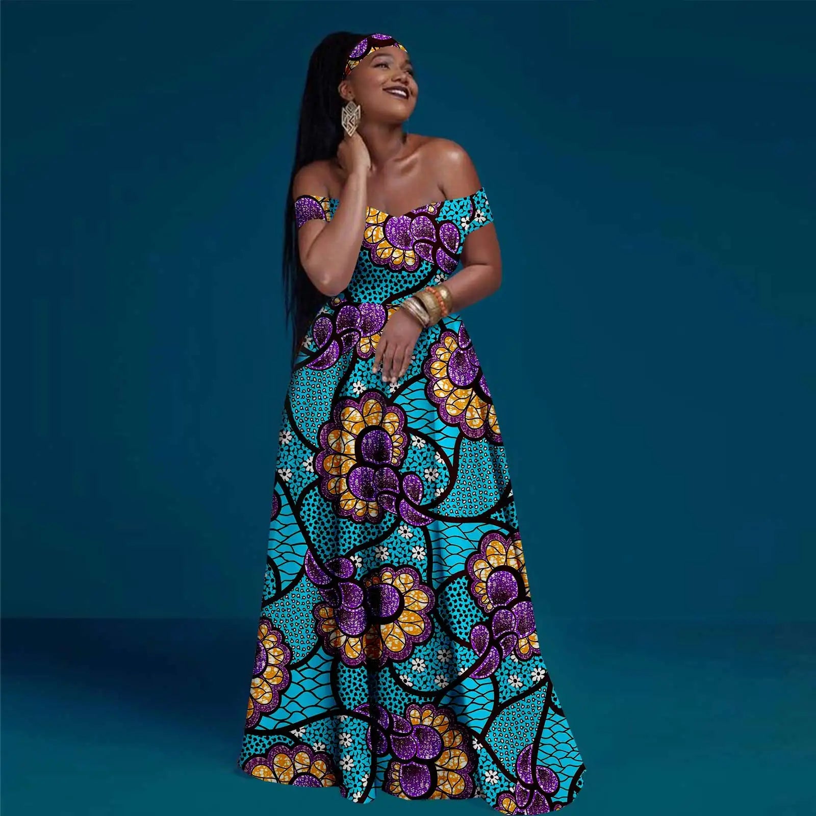 Woman wearing a colorful floral dress against a blue background