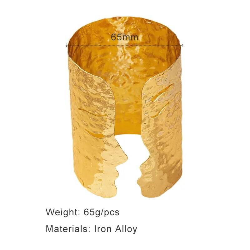 Golden Hour Cuff Bangle with 65mm diameter and 65g weight, made from iron alloy, featuring textured surface and abstract face cutout.