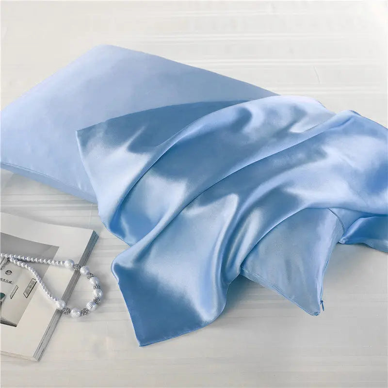 Sky blue natural mulberry silk pillowcase for locs. Ultra-soft, breathable, and designed to protect hair from frizz and breakage.