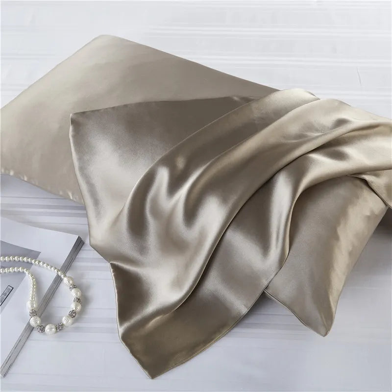 Luxurious natural mulberry silk pillowcase in champagne color, designed for locs. Smooth, breathable, and hypoallergenic for ultimate hair protection.