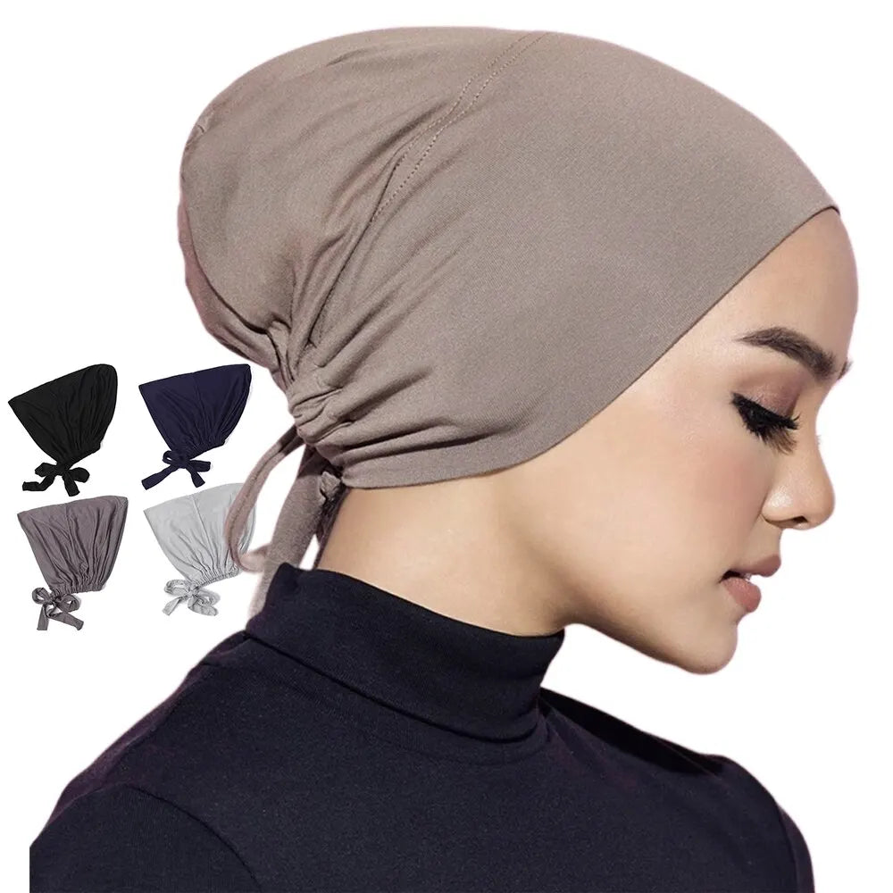 Easy to wear adjustable headwrap in beige, featuring a soft fabric with a secure tie-back design for a comfortable fit.