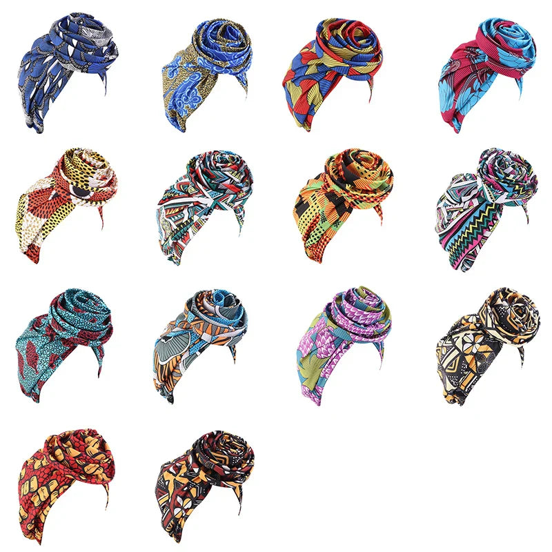 Collection of Afrocentric Melody Headwraps in various vibrant African prints. Satin-lined and pre-tied for easy wear and stylish hair protection.