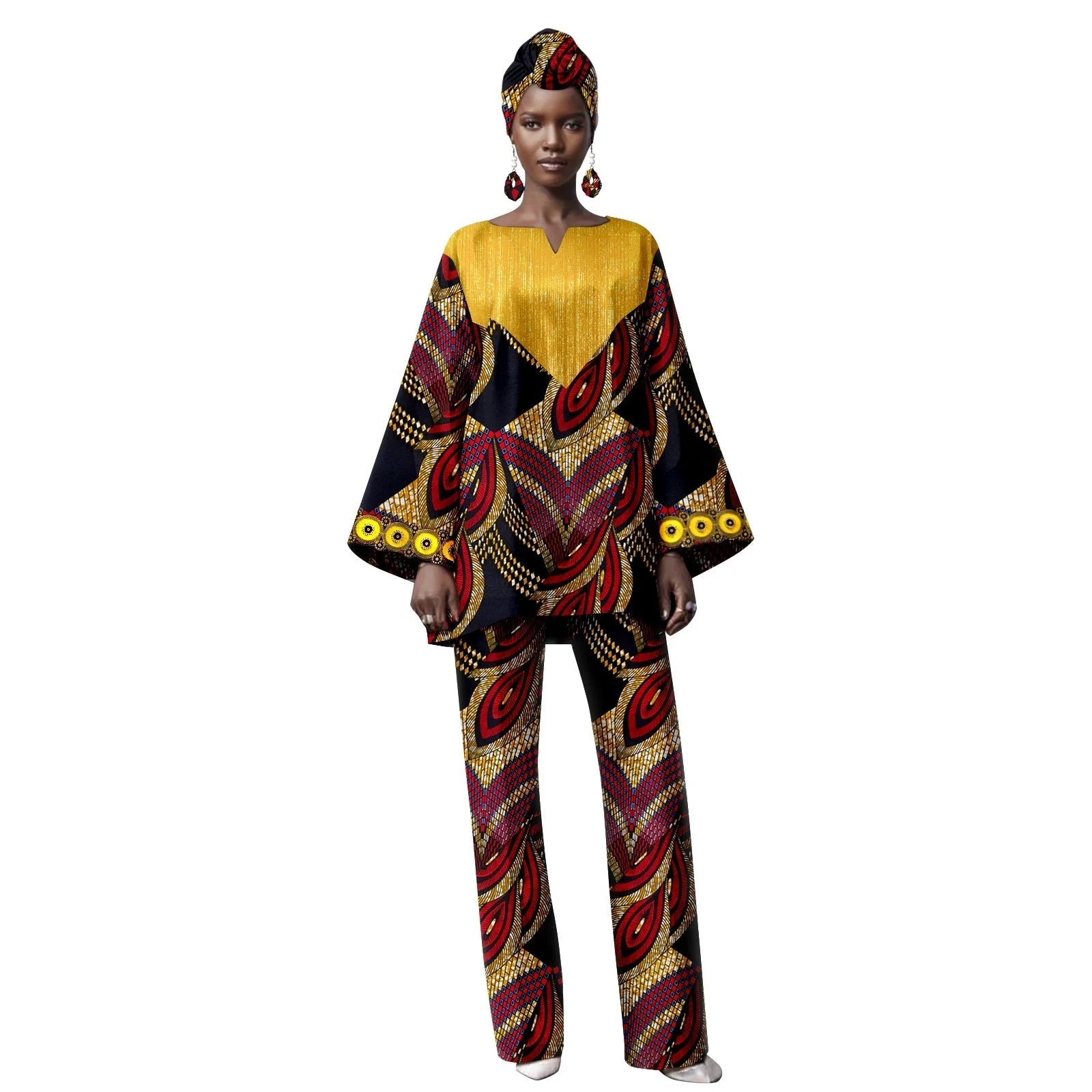 Woman wearing a colorful traditional outfit with a patterned top and pants on a white background.