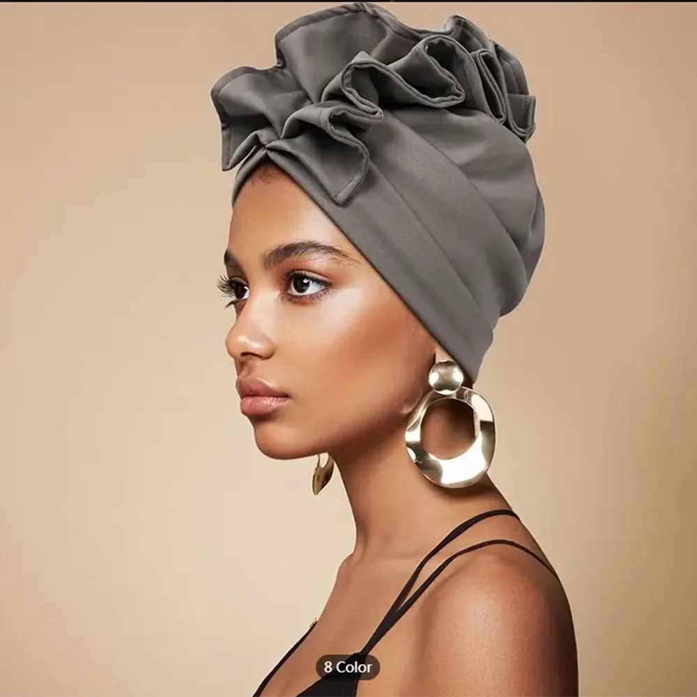 Rosette Radiance Premade Headwrap in gray, elegantly styled with ruffled detailing. A chic and effortless headwear accessory for any occasion.