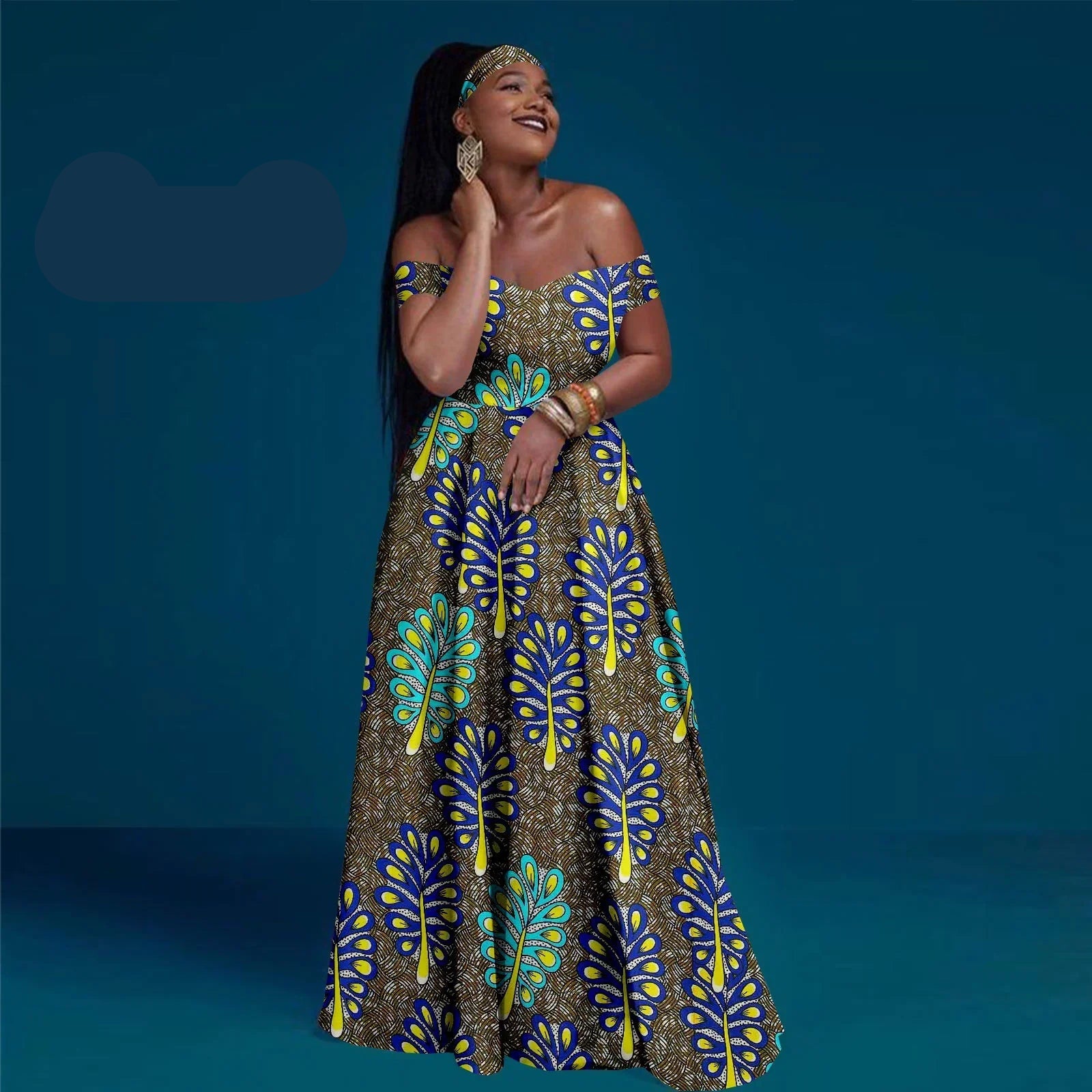 Woman wearing a colorful patterned dress on a blue background with &