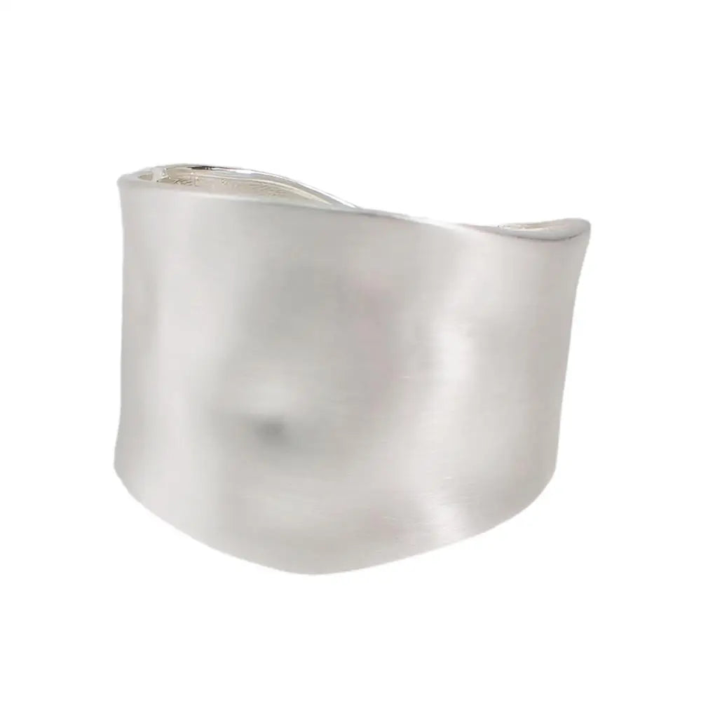 Minimalist silver Sunset Gleam Hair Cuff with a smooth, wavy surface, perfect for accessorizing dreadlocks and locs.