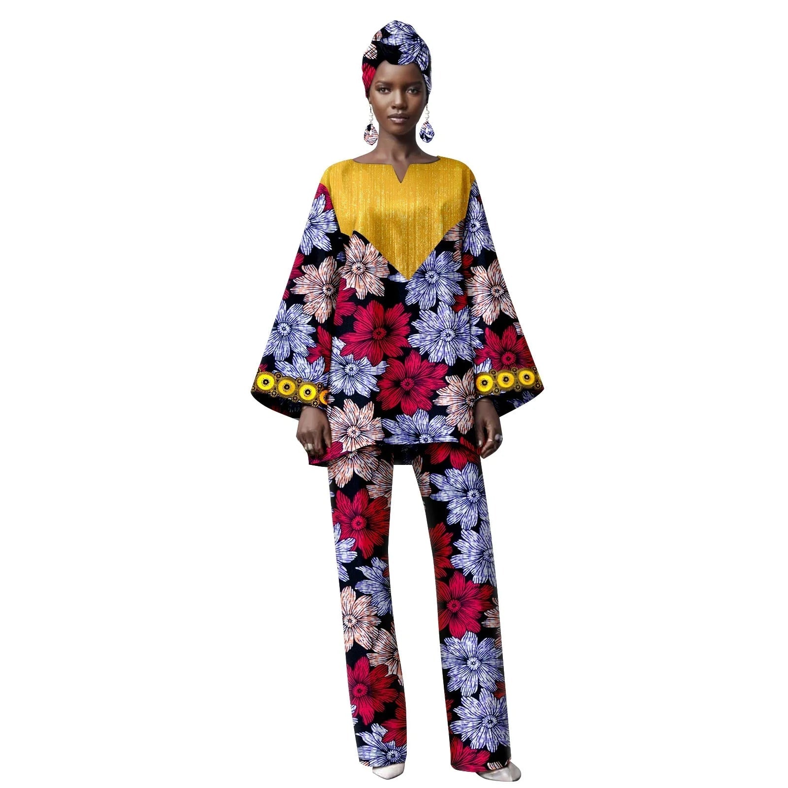 Woman wearing a colorful floral outfit with a yellow top on a white background