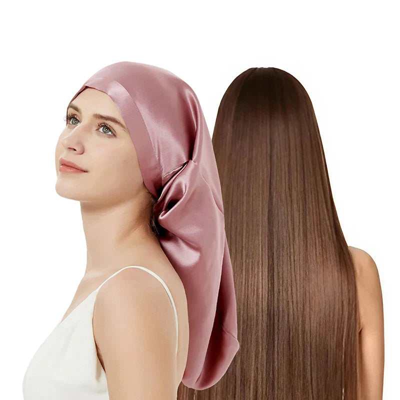 Pink Mulberry Silk Sleep Bonnet shown on woman with long straight hair. Designed for frizz-free mornings and protective overnight wear.