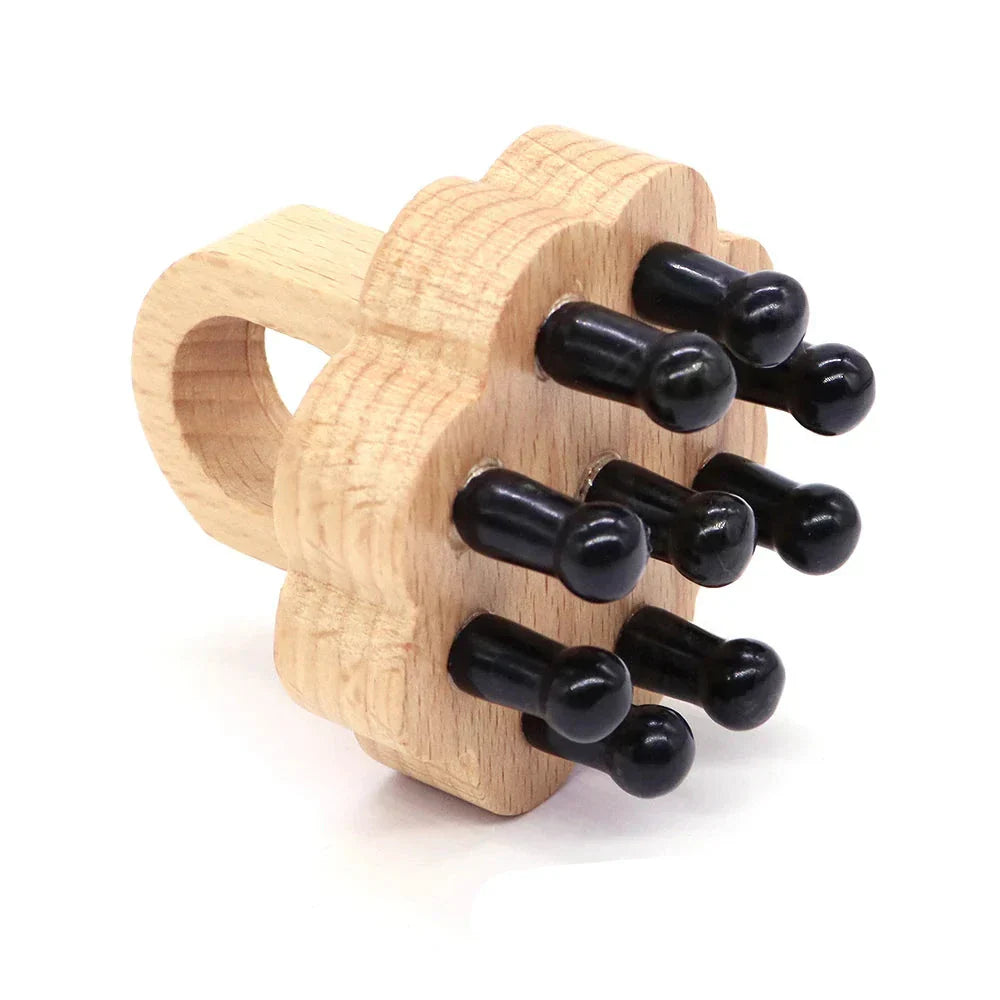 Black obsidian crystal scalp massager with ergonomic wooden handle. Designed to relieve stress and improve circulation.