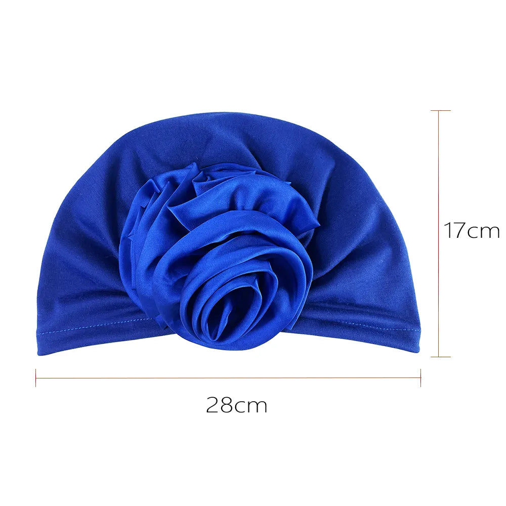 Royal blue floral stretch bandana head wrap with dimensions of 28cm width and 17cm height. Soft, stretchy fabric for a secure fit.
