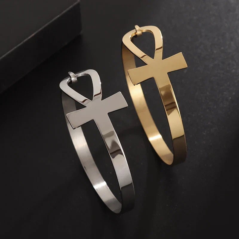 Faithful Embrace Hair Cuff and Bracelet in gold and silver tones featuring an elegant Ankh design. Stylish and versatile for hair or wrist wear.