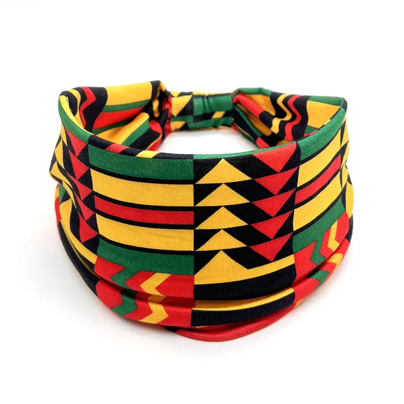 Kente-inspired extra wide yoga headband for braids, locs, sisterlocks, and dreadlocks. Vibrant African print for a bold and stylish look.