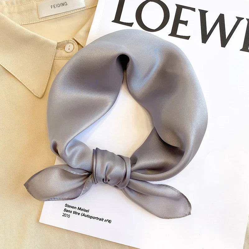 Silk Bandana Scarf - Ivory Elegant displayed on a beige shirt and fashion magazine. Pure 100% silk with a smooth, lustrous finish.
