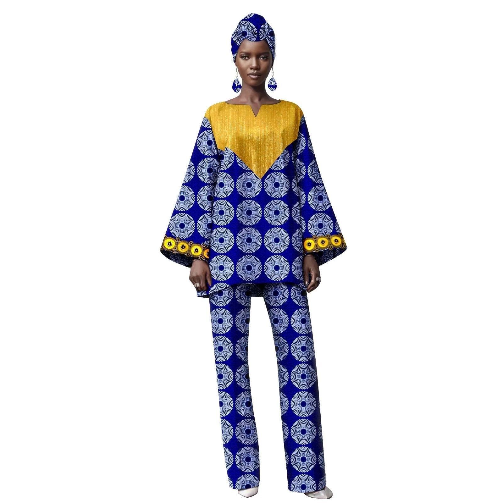 Woman wearing a blue and yellow outfit with circular patterns on a white background