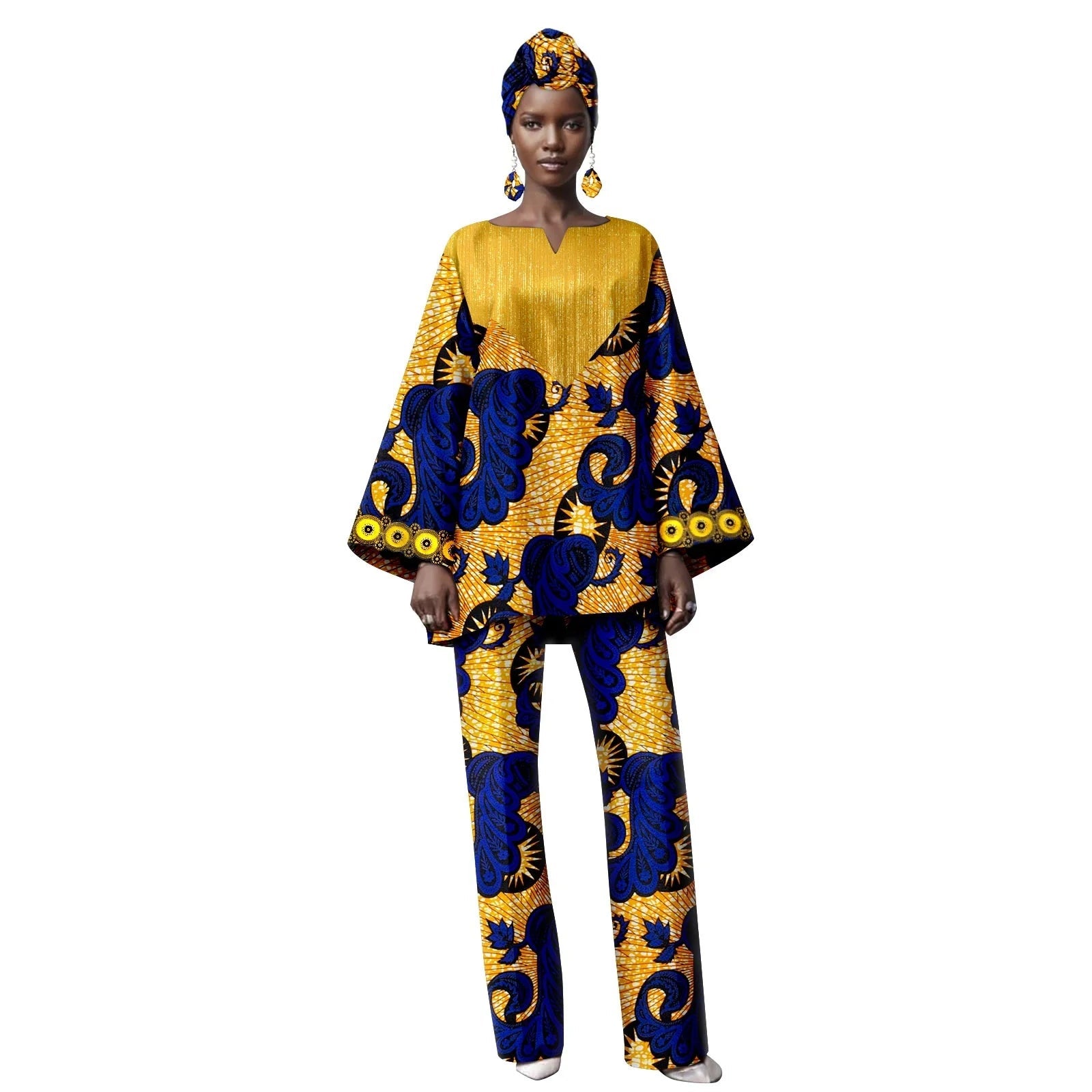 Woman wearing a yellow and blue patterned outfit with matching headwrap on a white background.