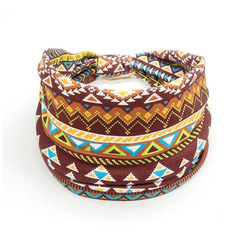Brown tribal-patterned yoga headband, extra wide for braids, locs, sisterlocks, and dreadlocks. Soft, breathable fabric for all-day comfort.