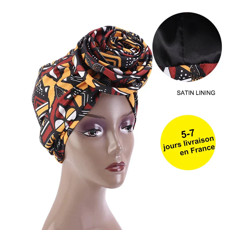 Black and gold Ankara head wrap with satin lining, available for fast delivery in France. Perfect for stylish hair protection.