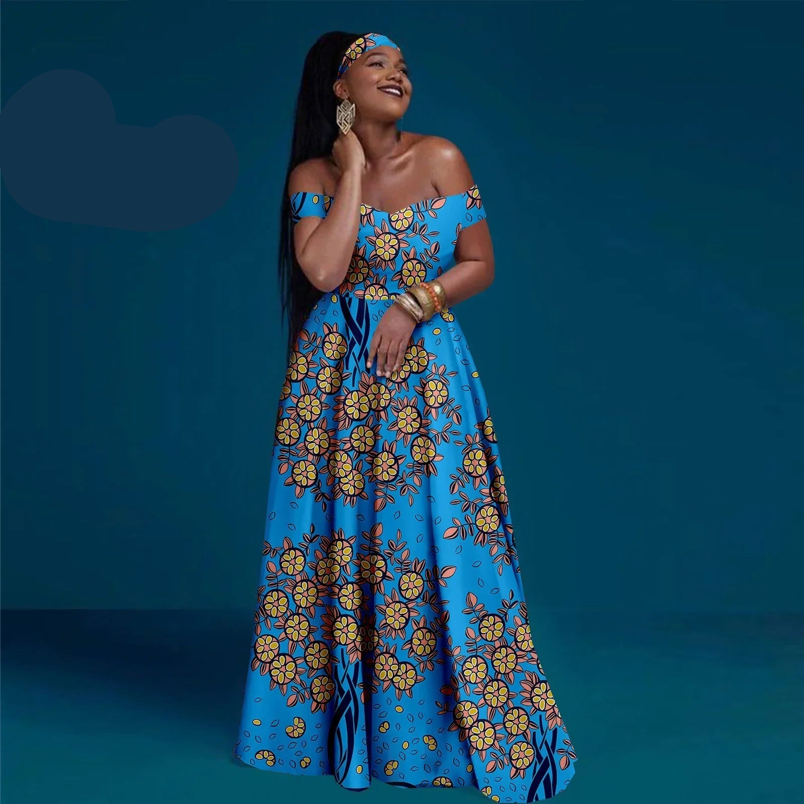 Woman wearing a blue floral dress against a dark blue background with &