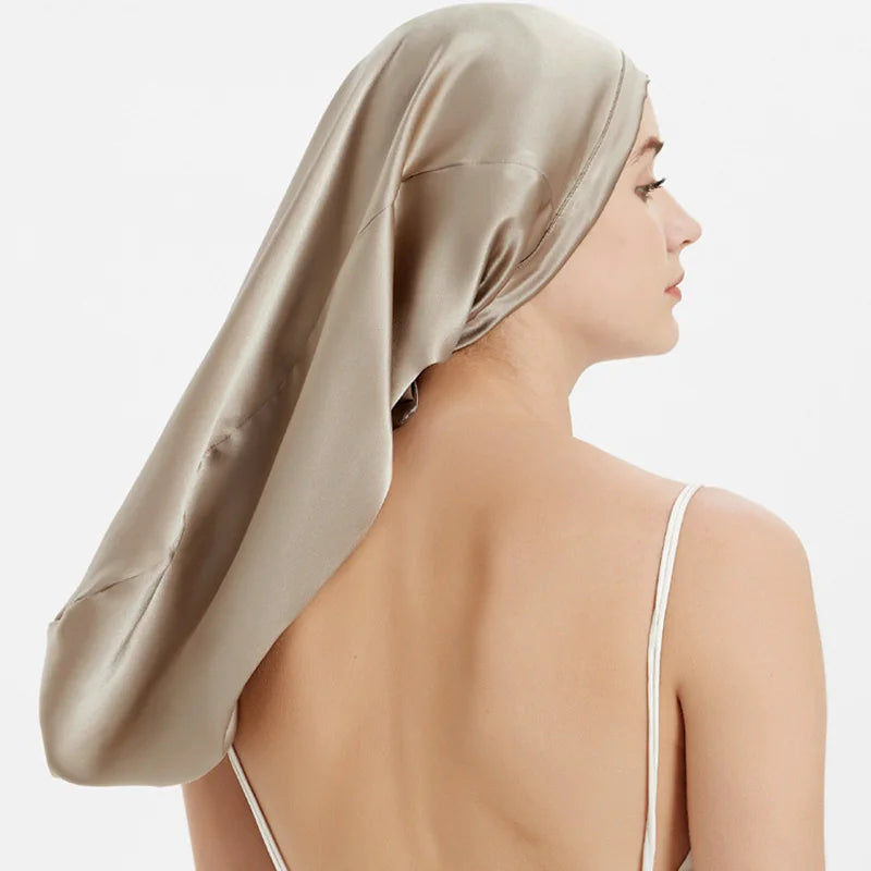 Back view of champagne Mulberry Silk Sleep Bonnet for long hair. Smooth silk headwrap with adjustable fit for overnight hair care.